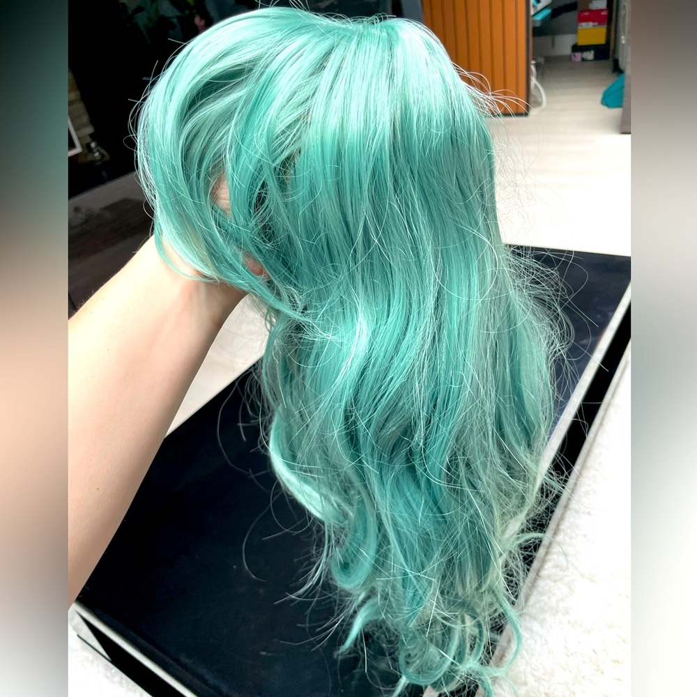 Teal wig with bangs